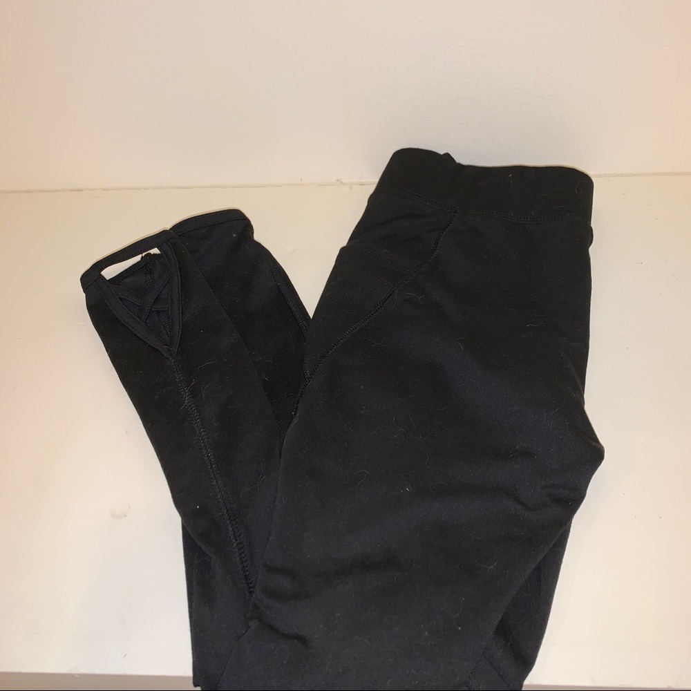 Athletic leggings with ankle cut outs